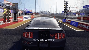 A Ford Mustang Boss 302 revs up for a drag race.